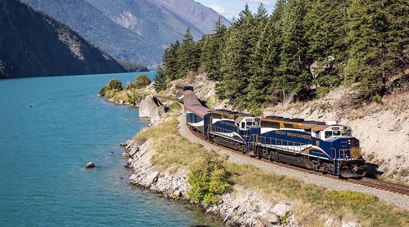 Rocky Mountaineer train along mountain and river