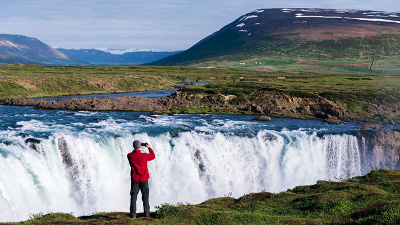 godafoss iceland waterfall person