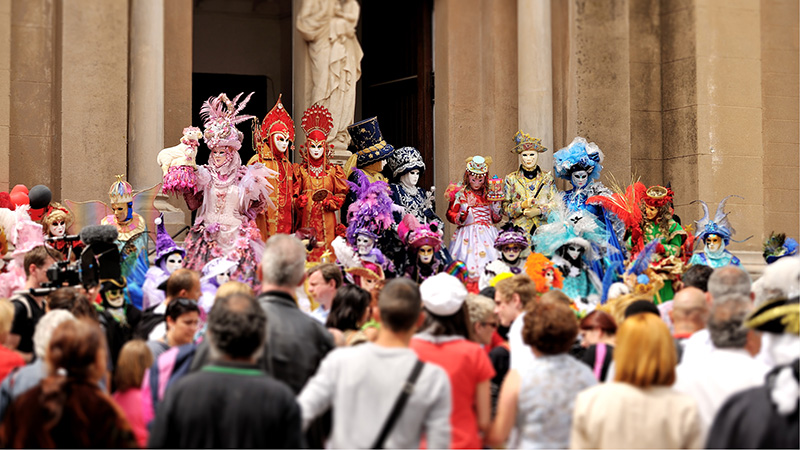 People in masks at the Venice Carnival